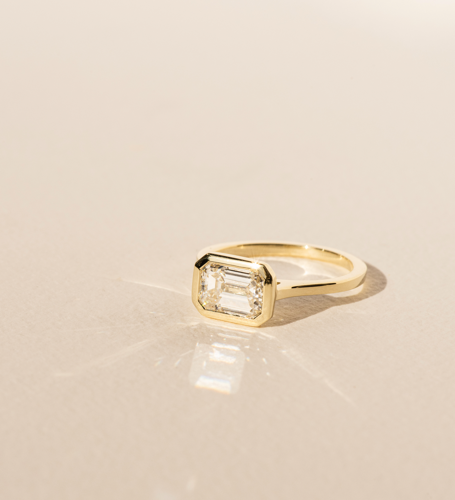 Dean & Dust Bespoke Jewellery Diamond Engagement Ring - Emerald Cut Diamond in Yellow Gold